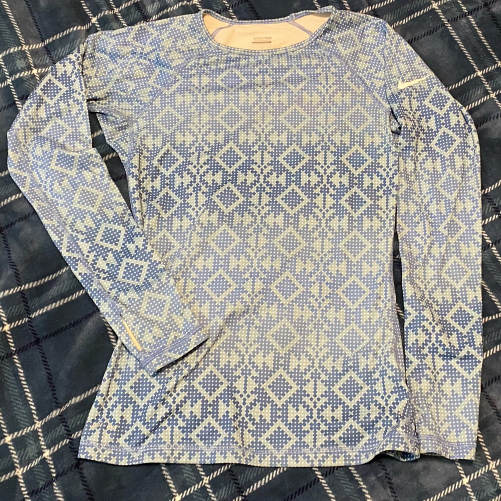 Nike long sleeve dri-fit running shirt with thumb holes. Size small.